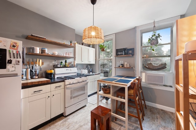 130 Coffey Street House, New York City, NY 11231 - kitchen featuring white appliances, open shelves, and healthy amount of natural light