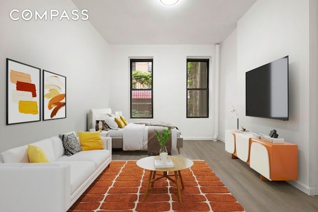312 W 49th St Unit 1Rw, New York City, NY 10019 - living area with wood finished floors and baseboards