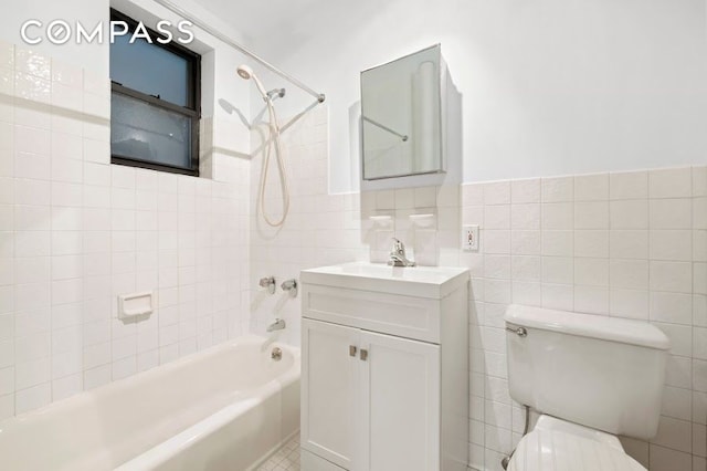 312 W 49th St Unit 1Rw, New York City, NY 10019 - full bathroom with vanity, bathtub / shower combination, and tile walls