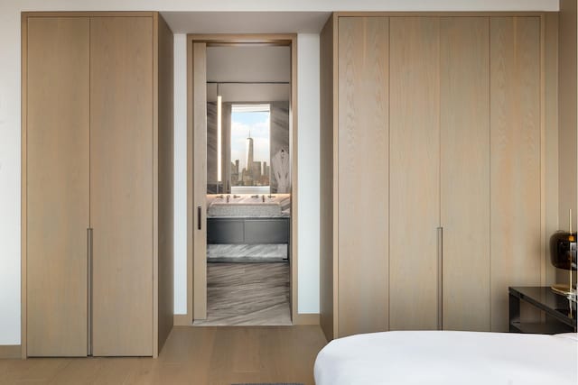 25 W 28th St Unit Ph40C, New York City, NY 10001 - bedroom with wood finished floors and ensuite bathroom