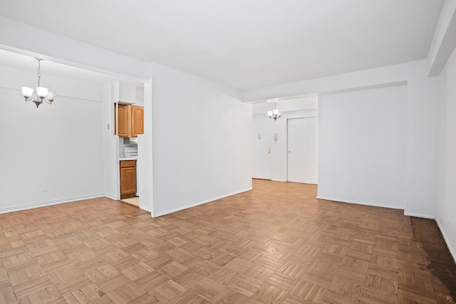 270 Jay St Unit 1D, New York City, NY 11201 - unfurnished room featuring a chandelier and baseboards