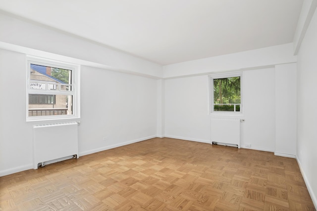 270 Jay St Unit 1D, New York City, NY 11201 - unfurnished room featuring radiator heating unit and plenty of natural light