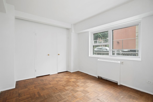 270 Jay St Unit 1D, New York City, NY 11201 - unfurnished bedroom featuring radiator and baseboards