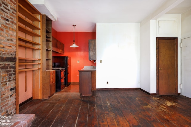 47 King St Unit 2, New York City, NY 10014 - kitchen featuring dark wood-type flooring, gas range, open shelves, and decorative light fixtures