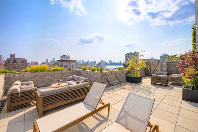 345 W 14th St Unit 5A, New York City, NY 10014 - view of patio / terrace with an outdoor hangout area and a skyline view