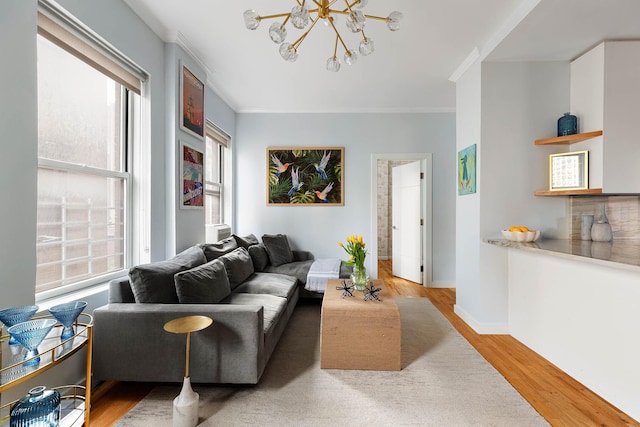 26 Gramercy Park S Unit 8Cd, New York City, NY 10003 - living area with a chandelier, healthy amount of natural light, wood finished floors, and crown molding