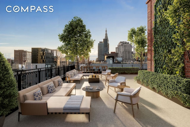 201 E 23rd St Unit 4B, New York City, NY 10010 - view of patio featuring an outdoor living space and a skyline view