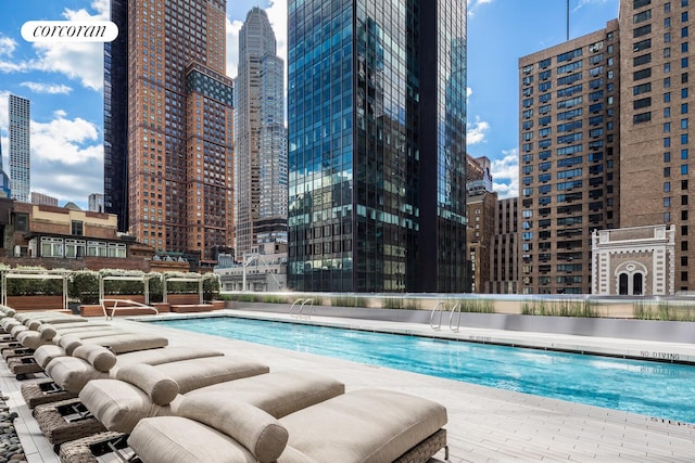 217 W 57th St Unit 82E, New York City, NY 10019 - community pool with a city view