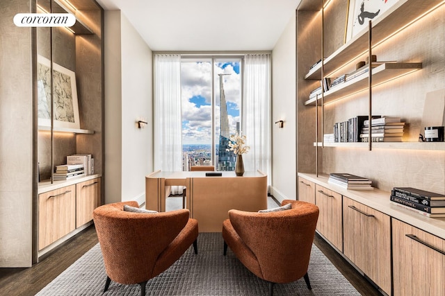 217 W 57th St Unit 82E, New York City, NY 10019 - living area with dark wood finished floors and a wall of windows
