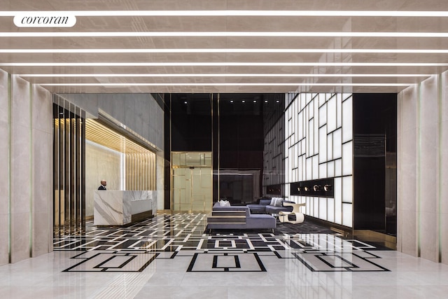 217 W 57th St Unit 82E, New York City, NY 10019 - common area with a high ceiling