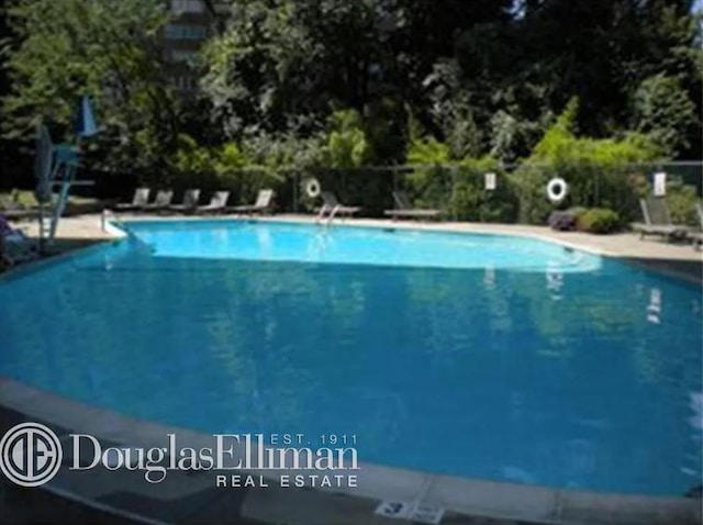 2727 Palisade Ave Unit 4L, New York City, NY 10463 - community pool with view of scattered trees