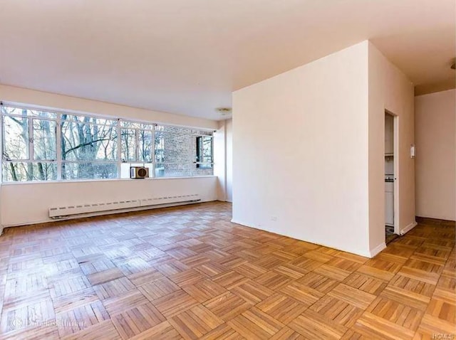 2727 Palisade Ave Unit 4L, New York City, NY 10463 - unfurnished room with a baseboard heating unit