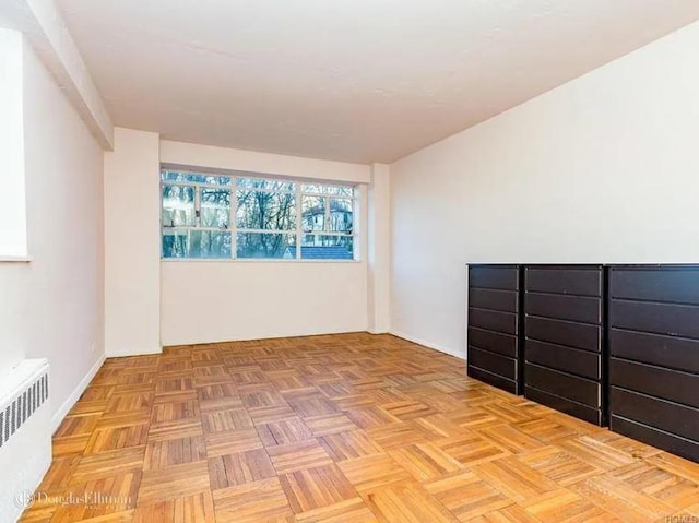 2727 Palisade Ave Unit 4L, New York City, NY 10463 - empty room featuring radiator heating unit