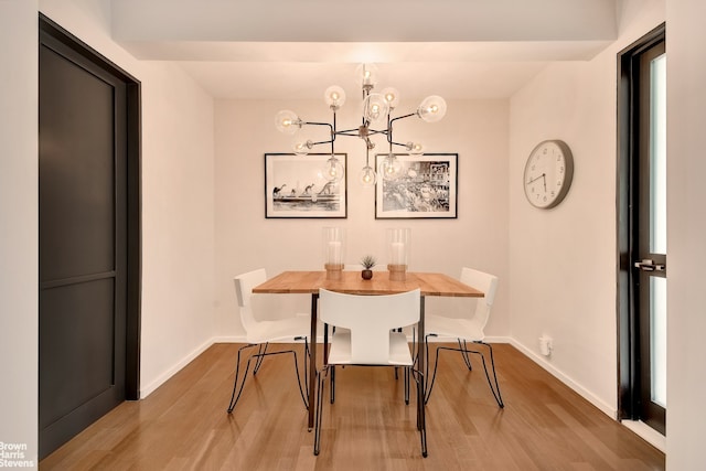 39 W 67th St Unit 1503, New York City, NY 10023 - dining area with wood finished floors and a chandelier