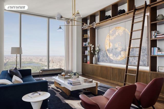 217 W 57th St Unit 84W, New York City, NY 10019 - living area with wood finished floors, wooden walls, and wainscoting