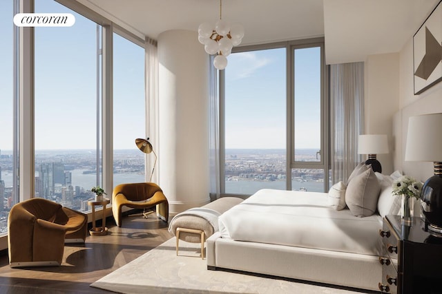 217 W 57th St Unit 84W, New York City, NY 10019 - bedroom with a city view, a wall of windows, wood finished floors, and a chandelier