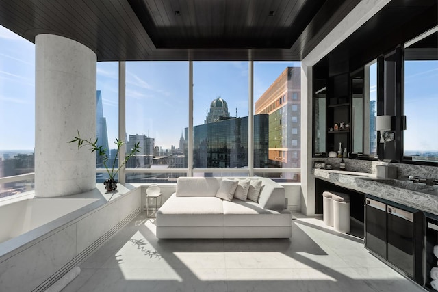 157 W 57th St Unit 64, New York City, NY 10019 - sunroom featuring a skyline view
