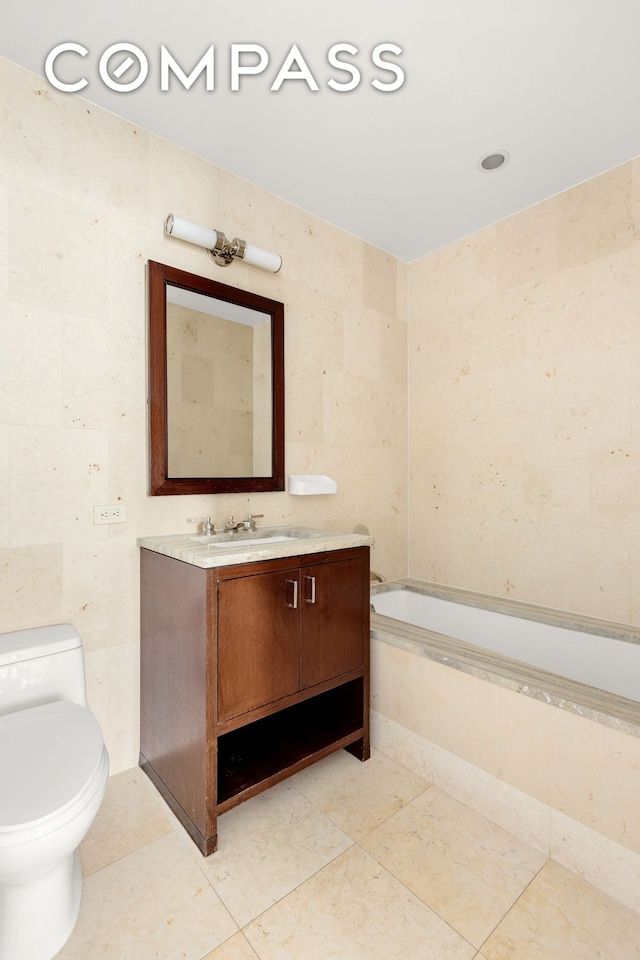 100 Riverside Blvd Unit 29C, New York City, NY 10069 - full bath featuring vanity, tile walls, tiled tub, and tile patterned floors
