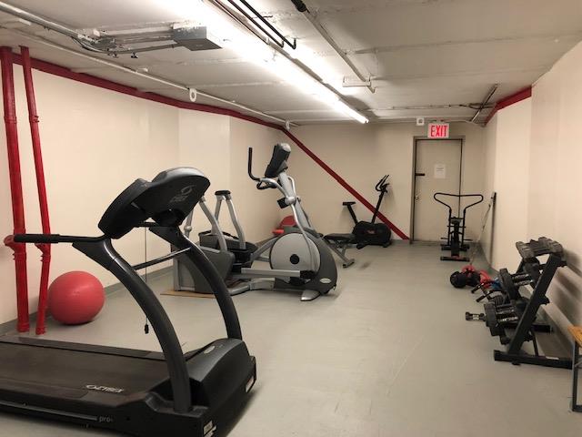 51 W 131st St Unit 4-A, New York City, NY 10037 - exercise room featuring a garage