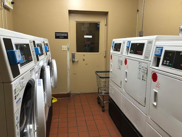 51 W 131st St Unit 4-A, New York City, NY 10037 - shared laundry featuring washing machine and clothes dryer, tile patterned flooring, and stacked washer / dryer