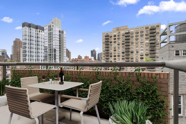 157 E 32nd St Unit 21B, New York City, NY 10016 - balcony featuring a skyline view and outdoor dining space