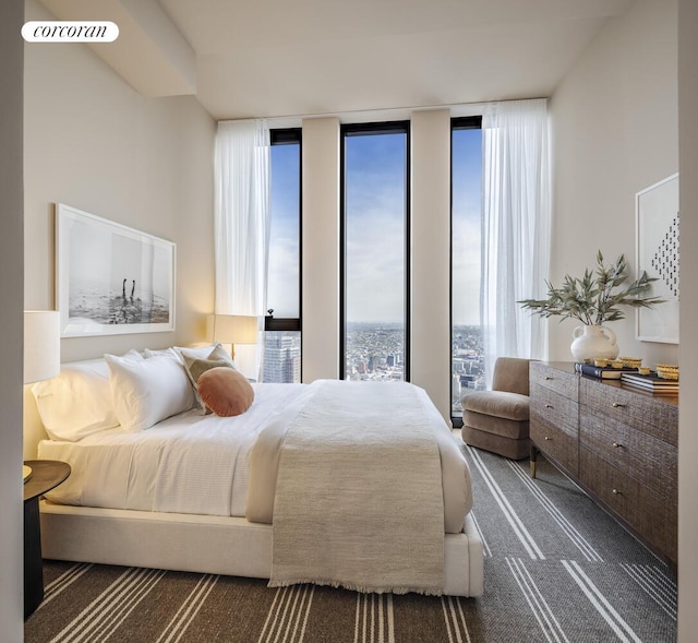 85 Fleet St Unit 73A, New York City, NY 11201 - carpeted bedroom featuring expansive windows and multiple windows