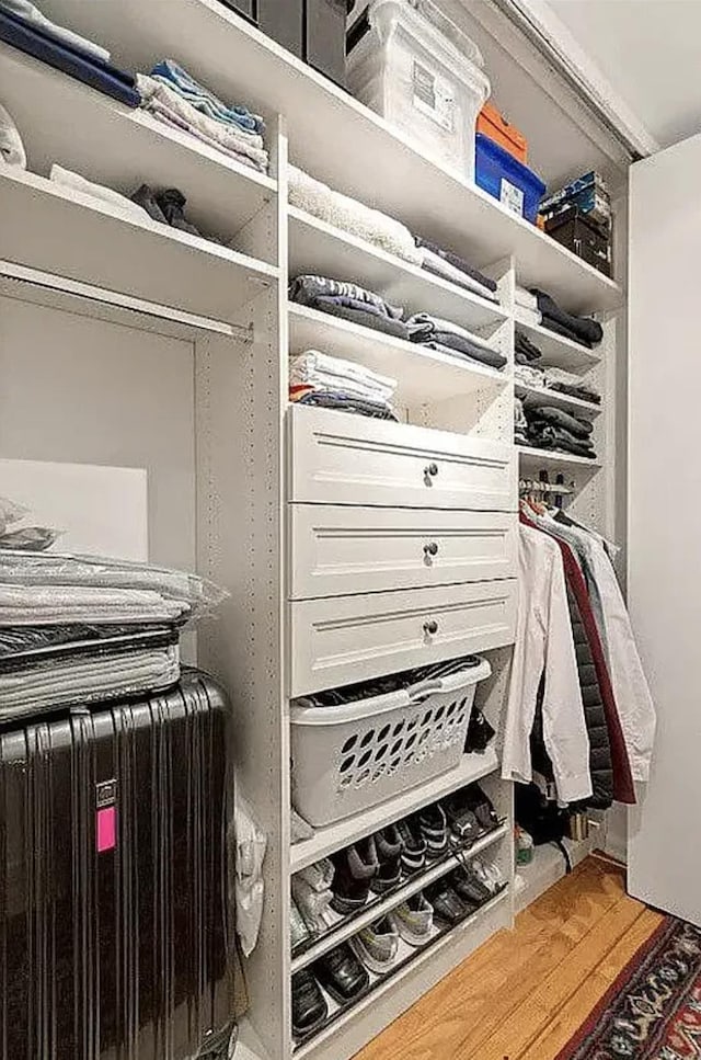 315 W 55th St Unit 1-D, New York City, NY 10019 - walk in closet with light wood finished floors