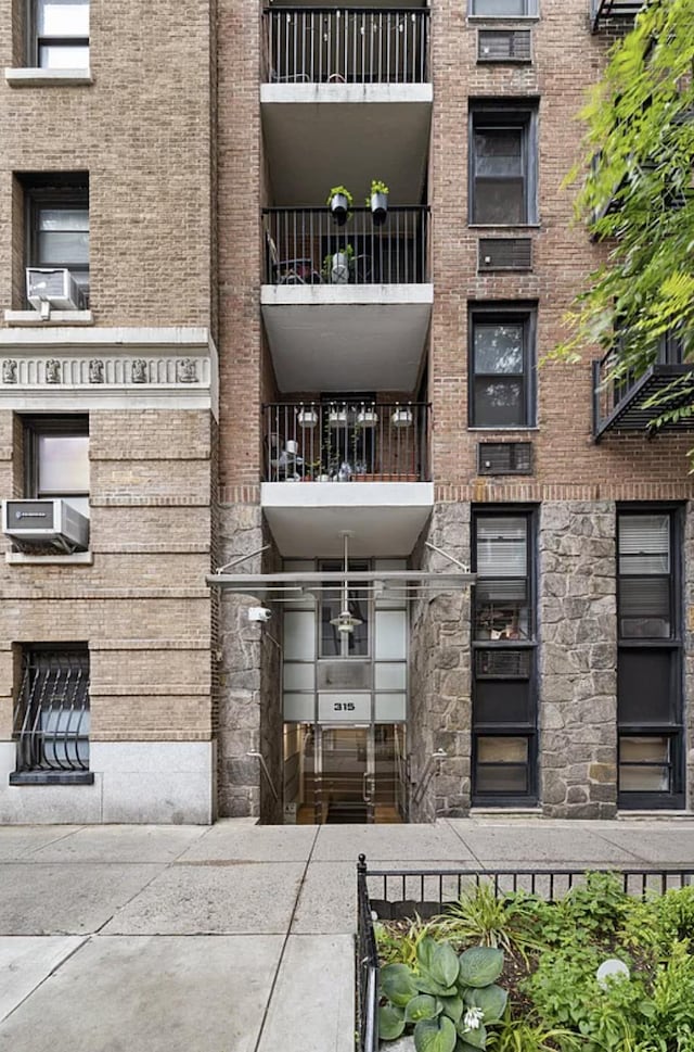 315 W 55th St Unit 1-D, New York City, NY 10019 - view of apartment building / complex with cooling unit