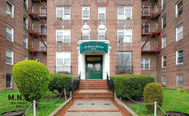 84-55 Daniels St Unit 3-H, New York City, NY 11435 - view of apartment building / complex with entry steps