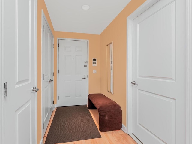 301 W 118th St Unit 7-H, New York City, NY 10026 - mudroom with baseboards and light wood-type flooring