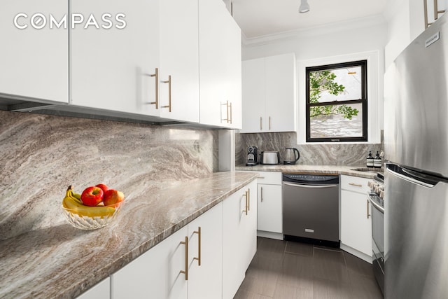 328 Sterling Pl Unit 1A, New York City, NY 11238 - kitchen with stainless steel appliances, white cabinetry, tasteful backsplash, and ornamental molding