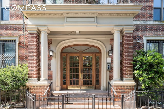 328 Sterling Pl Unit 1A, New York City, NY 11238 - property entrance featuring brick siding and french doors