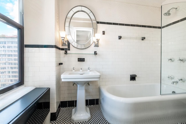 205 E 78th St Unit 14C, New York City, NY 10021 - full bathroom with bathtub / shower combination, tile walls, and tile patterned flooring