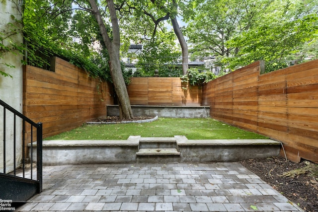 233 Bergen St, New York City, NY 11217 - fenced backyard featuring a patio