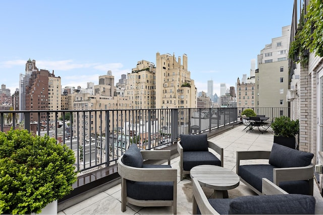 923 5th Ave Unit 12E/11, New York City, NY 10021 - balcony with a view of skyline and an outdoor living space