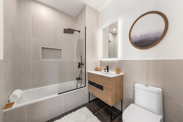900 Knickerbocker Ave Unit A1, New York City, NY 11207 - bathroom featuring tile walls, vanity, tiled shower / bath combo, and tile patterned flooring