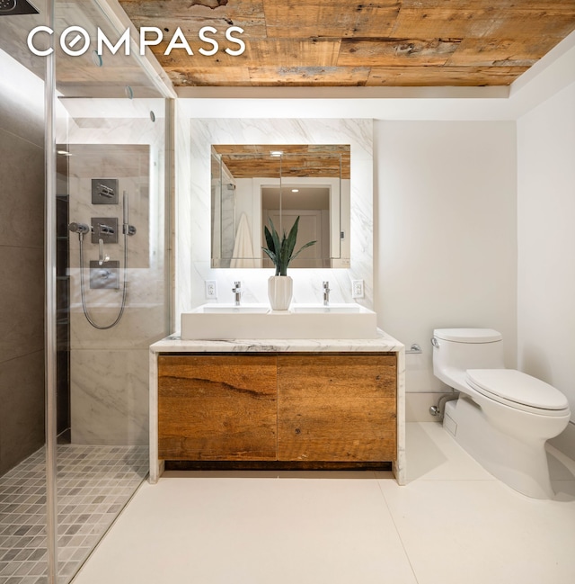 172 N 10th St Unit 3D, New York City, NY 11211 - bathroom with wooden ceiling, double vanity, a shower stall, and tile patterned floors