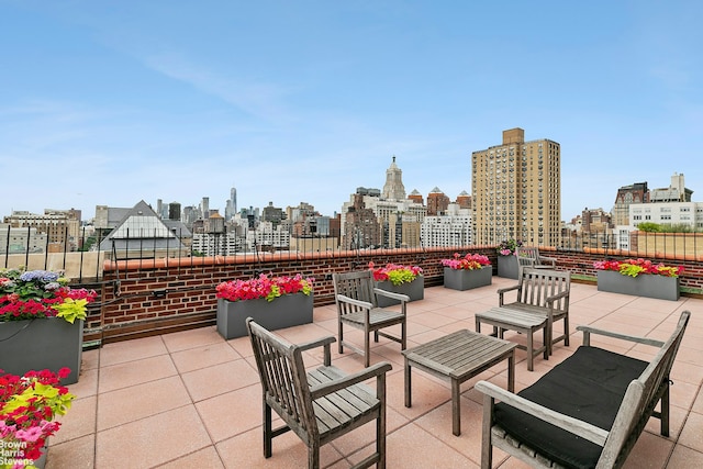 242 E 19th St Unit 13E, New York City, NY 10003 - view of patio / terrace featuring a skyline view and an outdoor hangout area