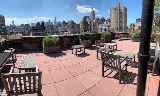 242 E 19th St Unit 13E, New York City, NY 10003 - view of patio featuring a view of skyline