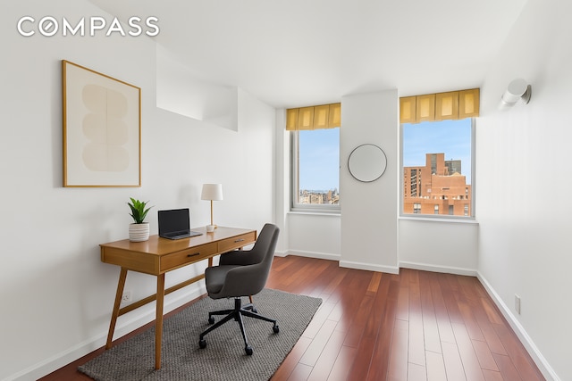 200 E 89th St Unit 34Cd, New York City, NY 10128 - office with dark wood-style flooring and baseboards