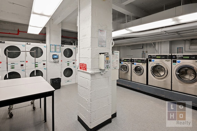 500 Grand St Cga, Unit Cga, New York City, NY 10002 - communal laundry room with stacked washer / dryer and washer and dryer