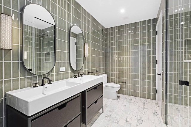 11 Hoyt St Unit 39F, New York City, NY 11201 - bathroom with tile walls, double vanity, and a tile shower