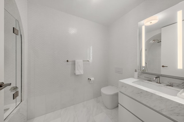 1228 Madison Ave Unit 4, New York City, NY 10128 - full bathroom featuring vanity, marble look tile flooring, and a shower