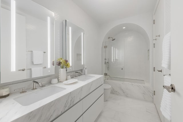 1228 Madison Ave Unit 4, New York City, NY 10128 - bathroom with double vanity, a combined bath / shower with marble appearance, and marble finish floors