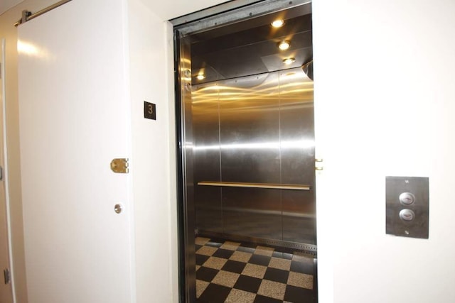 603 W 148th St Unit 3, New York City, NY 10031 - corridor with elevator and dark floors