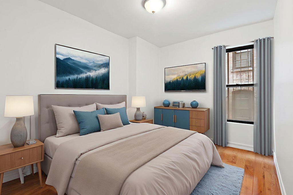 9 Pinehurst Ave Unit 1-C, New York City, NY 10033 - bedroom with light wood-style floors