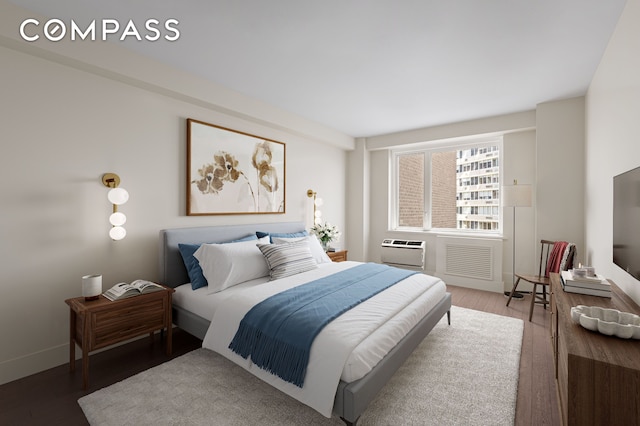 411 E 53rd St Unit 6L, New York City, NY 10022 - bedroom with wood finished floors and a wall mounted air conditioner