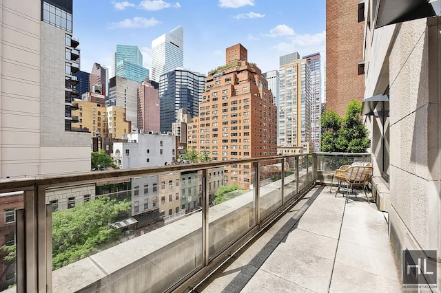 301 E 50th St Unit 5B, New York City, NY 10022 - balcony featuring a skyline view