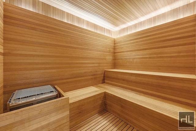 301 E 50th St Unit 5B, New York City, NY 10022 - relaxing sauna / steam room featuring wood walls