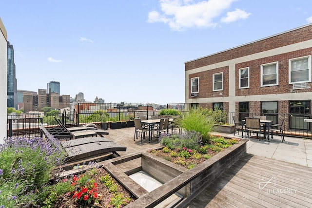 422 State St Unit 6, New York City, NY 11217 - wooden deck featuring outdoor dining area